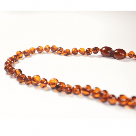 Collier bébé ambre/cognac Irreversible